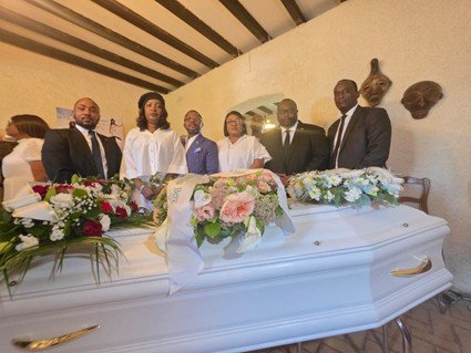 Ambassador Gberie Joins Family to Lay Ms. Wadia Nathalie Nina Berge to Rest